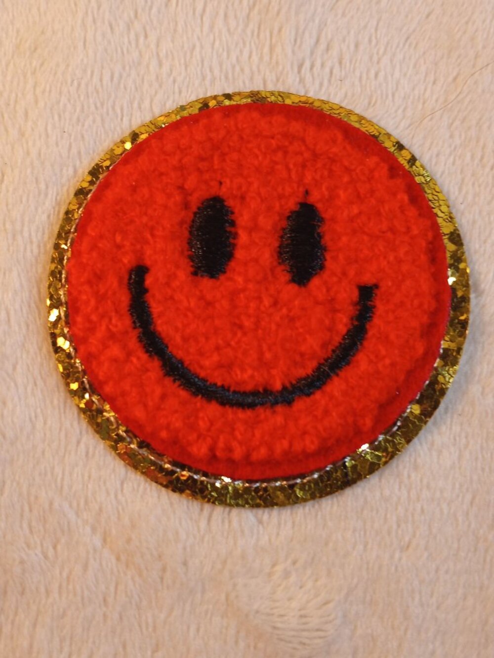 Iron on red smiley face chenille patch